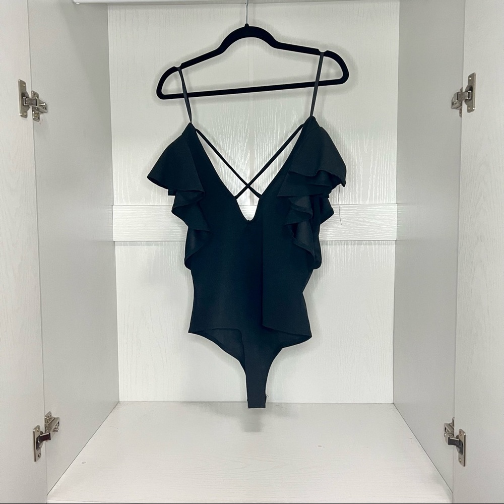Ruffle sleeve black body suit
